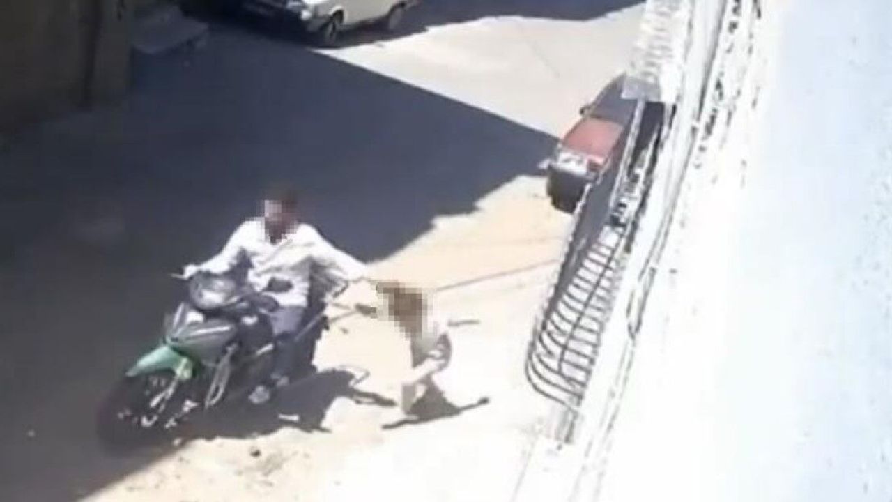 Kızını darp edip motosikletle sürükleyen babanın 12 suç kayd