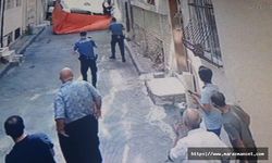 Evini ateşe verip balkondan atlayan genci itfaiyecinin ani refleksi kurtardı