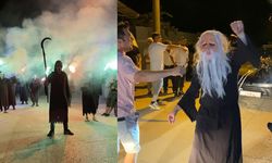Yüzlerinde maske, ellerinde orakla damadı karşıladılar