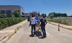Yaktıkları ateşi söndürmeye çalışırken yaralandılar