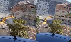 Yıktığı binanın altında kalmaktan saniyelerle kurtuldu
