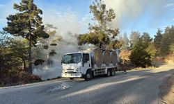 Orman yangınında alevlere sütle müdahale etti