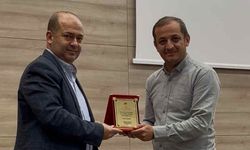 Gazeteci Halil Öksüzce’ye anlamlı plaket