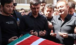 Saldırıda ölen öğretmenin eşi ve çocukları tabut başında gözyaşı döktü